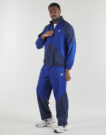 Veste de sport New Balance SPORT LEGACY bleue pour homme - Taille 3