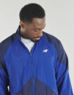 Veste de sport New Balance SPORT LEGACY bleue pour homme - Taille 5