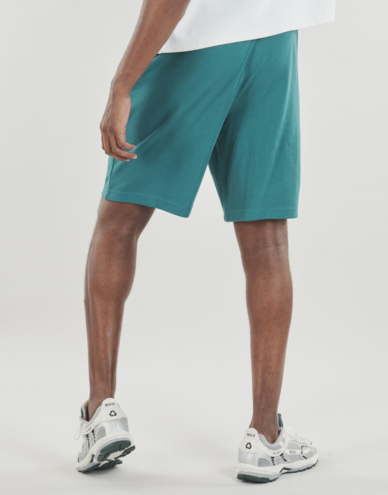 Pantaloni corti Puma ESS ELEVATED Relaxed Shorts 9' Verde Pantaloni corti Uomo - 4